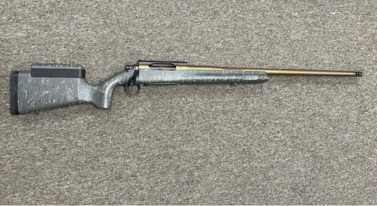 Christensen Arms Mesa Long Range Bolt action, 26 in 1-10 twist Barrel, 300 Winchester Magnum, Bronze finish, after market cheek riser, 0 MOA scope rail, OEM compensator, OEM carbon fiber composite camo stock, OEM trigger