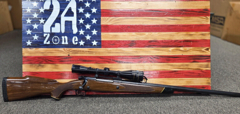 Winchester Model 70 XTR, Bolt Action, .243 Winchester, made in new haven, conn., Leupold 3x9 magnification scope, leupold scope mount, special edition black, white, and wood grain stock, OEM buttpad, 24.5" Barrel