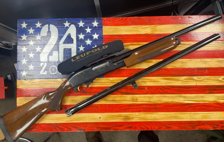 Remington 870 Wingmaster, Blued, 12 guage, gold trigger, 19.5" Barrel, comes w/ 28.5" hunting barrel, 2 - 7x 33 Leupold Optic, high shine wood furniture.