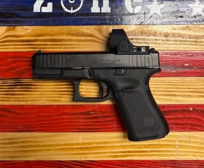 Glock 19 Gen 5, 4.02" Barrel, Black, 9mm Semi Auto Pistol. Trijicon SRO 5.0 MOA.